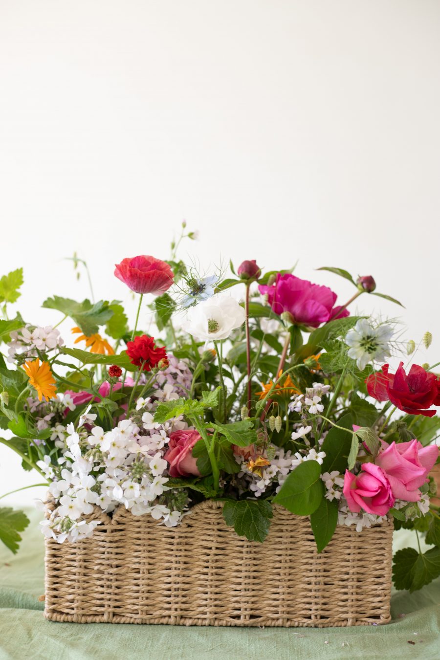 DIY Flower basket and other simple cut flower arrangements. Locally grown flowers for a wedding in Leigh-on-Sea.
